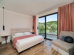 Кровать или кровати в номере Villa Tonia Livadh Himare