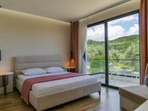 Кровать или кровати в номере Villa Tonia Livadh Himare