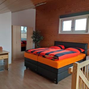 Postel nebo postele na pokoji v ubytování Gästewohnung im Papenteich