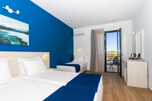 Posteľ alebo postele v izbe v ubytovaní Azul Eco Hotel