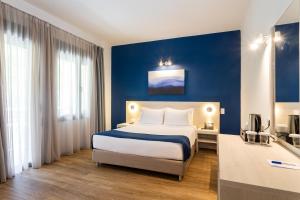 Posteľ alebo postele v izbe v ubytovaní Azul Eco Hotel
