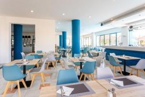 Reštaurácia alebo iné gastronomické zariadenie v ubytovaní Azul Eco Hotel
