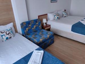 Postel nebo postele na pokoji v ubytování Albatros 2 Family Hotel