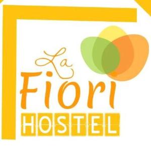 a sign that says a floridated with orange and green at fiori centro in Brasília