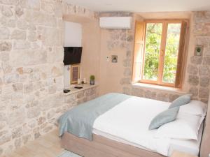 Posteľ alebo postele v izbe v ubytovaní Ella la Bella II Dubrovnik Old town