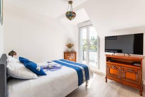 Et tv og/eller underholdning på Le Petit Roof Top