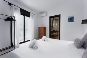 En eller flere senge i et værelse på Estepona casco antiguo 2339