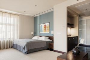 Postel nebo postele na pokoji v ubytování Hotel Bergs Suites