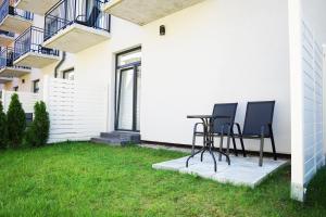 Vonkajšia záhrada v ubytovaní IND.U Apartamenty