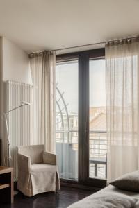 Postel nebo postele na pokoji v ubytování Hotel Bergs Suites