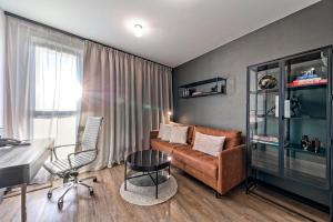 Uma área de estar em Focus Hotel Premium Warszawa