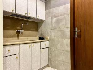 Virtuvė arba virtuvėlė apgyvendinimo įstaigoje Afaq Al Masi Hotel ex Al Sumou Hotel
