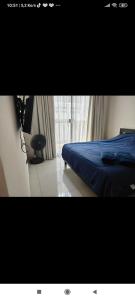 Postel nebo postele na pokoji v ubytování Laguna bay1 by echoes