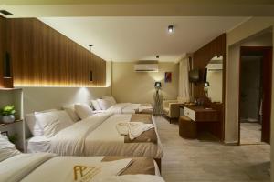 Una cama o camas en una habitación de PANORAMA view pyramids
