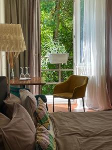 Postel nebo postele na pokoji v ubytování SURF HOUSE DREAMERS COAST + 47 fotografií