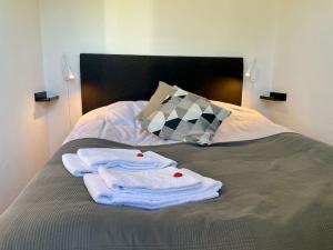 Postel nebo postele na pokoji v ubytování HYGGE Strand Camping