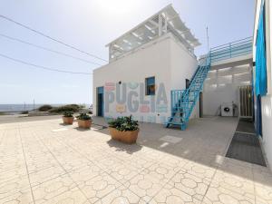 Photo de la galerie de l'établissement La Corte sul Mare Puglia On line, à Torre San Giovanni