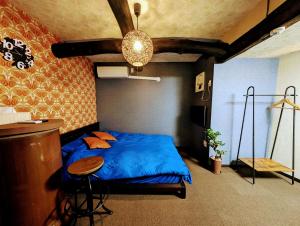 Letto o letti in una camera di 四季の宿 徹星