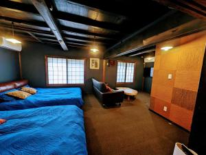 Letto o letti in una camera di 四季の宿 徹星