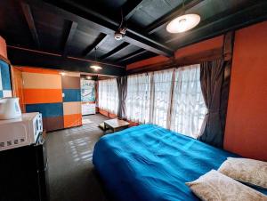 Letto o letti in una camera di 四季の宿 徹星