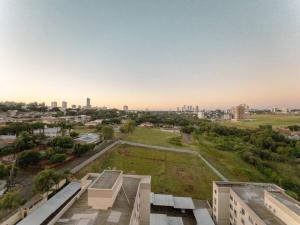an aerial view of a city with buildings at Apartamento Novo - LZ1003 in Maringá