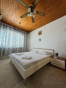 Postel nebo postele na pokoji v ubytování "Azzurra Apartments