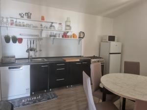 Kuchyň nebo kuchyňský kout v ubytování Villa Oliva