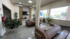 TV a/nebo společenská místnost v ubytování Hotel Amazon Palace