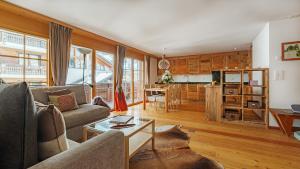 Kuchyň nebo kuchyňský kout v ubytování Haus Malva by Zermatt Premium Apartments