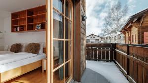Postel nebo postele na pokoji v ubytování Haus Malva by Zermatt Premium Apartments