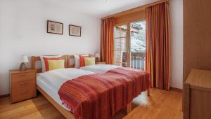 Postel nebo postele na pokoji v ubytování Haus Malva by Zermatt Premium Apartments