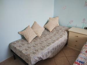 Postel nebo postele na pokoji v ubytování Fòndaco Scandicci
