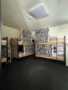 Postel nebo postele na pokoji v ubytování Hostel John Galt