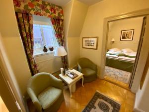 Katil atau katil-katil dalam bilik di Hotel Royal