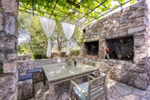 Patio alebo iná vonkajšia časť ubytovania Villa Menta 1