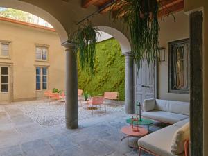 Posedenie v ubytovaní REGO APARTMENTS - Boutique Aparthotel & Serenity Spa with some off-site apartments in the Heart of Bergamo City Center