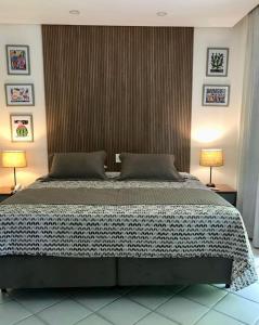 Cama ou camas em um quarto em Hotel 7 Colinas