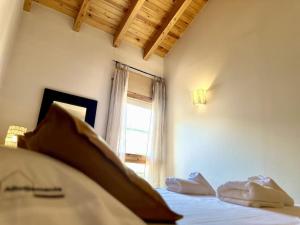 Postel nebo postele na pokoji v ubytování Lludriga, alojamiento en Martinet, Puigcerdá