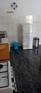 Kuchyň nebo kuchyňský kout v ubytování Apartmani Kolenić