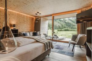 Postel nebo postele na pokoji v ubytování Sportresidenz Zillertal - 4 Sterne Superior + 37 fotografií