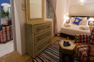 Postel nebo postele na pokoji v ubytování Riad Ikalimo 2