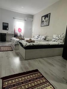 Postel nebo postele na pokoji v ubytování Complex Praga