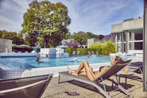 Bazén v ubytování Mondorf Parc Hotel & Spa nebo v jeho okolí