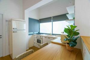 Kuchyňa alebo kuchynka v ubytovaní Amazing loft visionary apartment