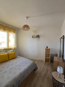 Postel nebo postele na pokoji v ubytování Le Sailor - Appartement à la plage