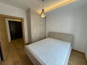 Postel nebo postele na pokoji v ubytování Moka