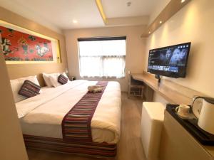Rúm í herbergi á ViaVia Boutique Hotel - Kathmandu