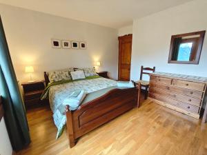 Postel nebo postele na pokoji v ubytování Albergo Diffuso Costauta