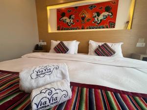 Rúm í herbergi á ViaVia Boutique Hotel - Kathmandu