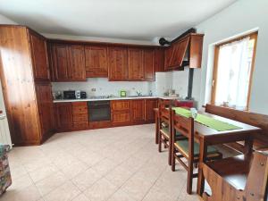 Kuchyň nebo kuchyňský kout v ubytování Albergo Diffuso Costauta